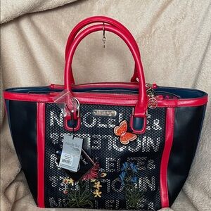 Nicole Lee Black Tote with Red Trim and Floral Appliqué